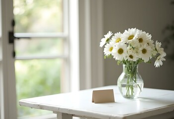 Daisy flower in the beautiful vase on the light white wood table with vintage background in the living room french style bright light from the window