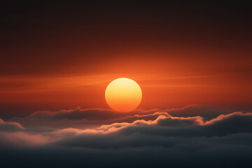 Fototapeta premium Vibrant Red Sun Setting Above Clouds