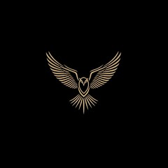 Fototapeta premium Golden eagle silhouette on black background.