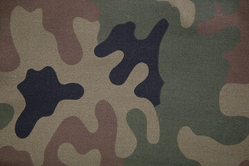 Fabric with military camouflage pattern a background or texture © Janusz