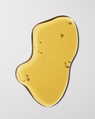Close-up of golden oil drops, 3d rendering beauty product face serum cosmetic minimalist background