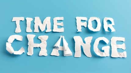 &ldquo;Time for Change&rdquo; Message in Torn Paper Letters on Blue Background