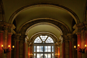 Fototapeta premium Illuminated arcade in the interior of the Royal Palace, Madrid, Spain