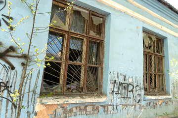 Broken Windows in an Abandoned House