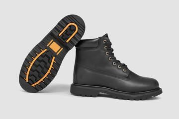 Black leather boots on white background. Fashion 