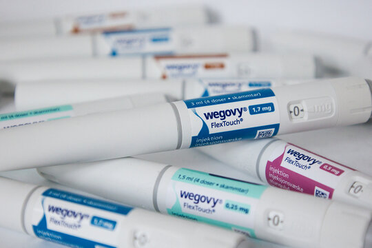 Pile of injection pens with different doses of Wegovy 