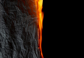 burning paper, glowing edge of paper on a black background