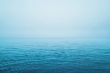 Obraz premium A serene lake scene with a small boat visible in the distance