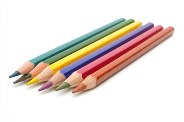 Fototapeta premium A collection of colored pencils placed side by side, ready for use