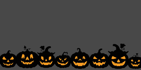 A row of carved jack-o’-lanterns with glowing orange faces on a dark background, perfect for Halloween night or spooky events.