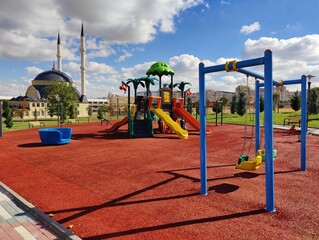 A Playground of Colors and Faith: A Space Where Childhood Meets Tranquility Near the Mosque
