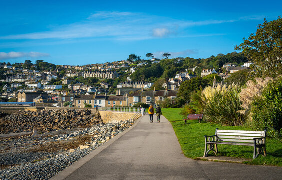 Seaside town of Newlyn in Cornwall, England. View of the seafront promenade on a sunny summer day