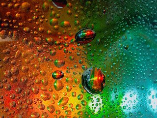 Colorful display showing how water and oil do not mix vivid tones macro shot hdr soothing,Colorful background with water drops on it
