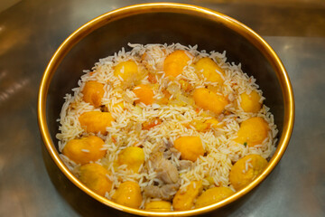 Traditional Brazilian dish chicken with pequi (caryocar brasiliense) and rice