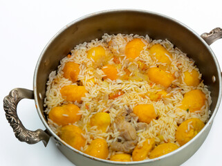 Traditional Brazilian dish chicken with pequi (caryocar brasiliense) and rice