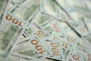 Big amount of american USD hunderd dollar bills banknotes close up
