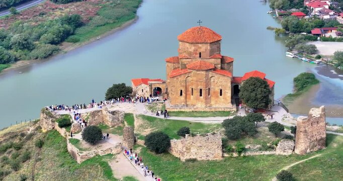 Drone flight over Jvari Monastery near Mtskheta, Georgia, on a sunny day, with beautiful views