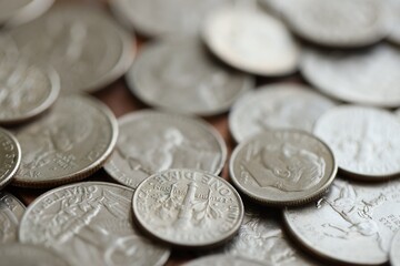 Pile with big amount of silver american cent coins as United States currency
