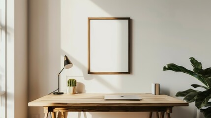 A minimalist desk setup with white walls and wooden accents. The desk highlights a blank picture frame and a small, stylish lamp. Bright
