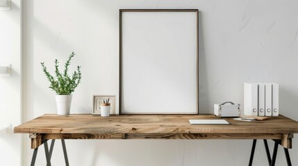 A minimalist home office with white walls and a wooden desk. A blank picture frame is the focal point