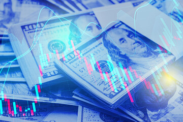 Currency trading. Dollar bills and graphs, toned in blue