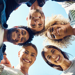 Friends, portrait and huddle for bonding, blue sky and confident support in nature park. Below...