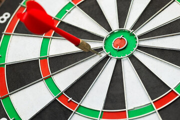 An arrow that missed the center of the target by a short distance, something close to success,...