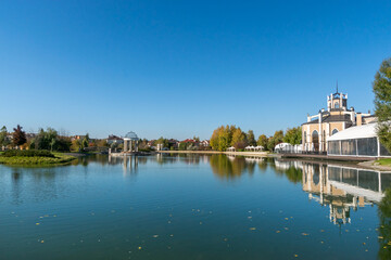 Country landscape on a clear sunny day. The river surface.  Beautifully equipped promenade for recreation.