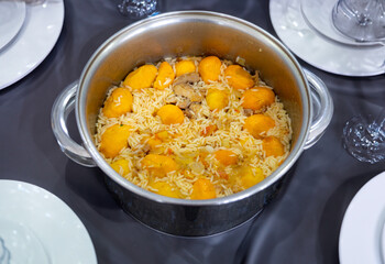 Traditional Brazilian dish chicken with pequi (caryocar brasiliense) and rice