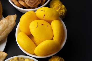 Rajbhog or kesar bati is a traditional Bengali sweet Rasgulla made using paneer or chena and flavoured with saffron and rose essence