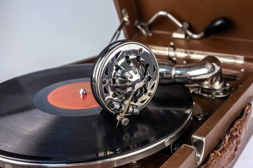 Purchased (consumer) vintage phonograph pickup close-up on a white background © Александр Коликов