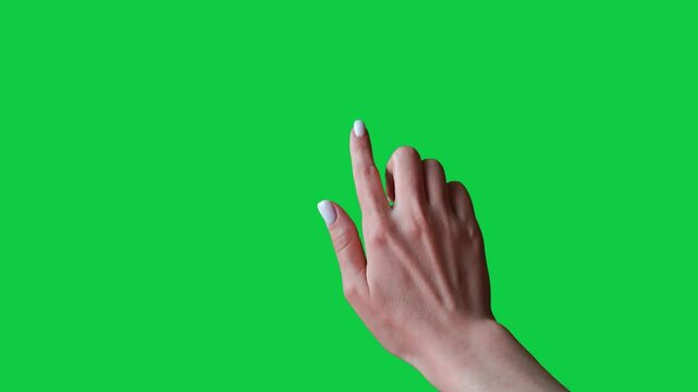 Swipe up gesture. Female hand scrolls up swiping on chroma key green screen background. Using a smartphone, tablet pc or a touchscreen. Interface concept. Scroll up and down and tap with finger