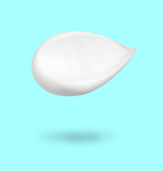 Cosmetic product in air on light blue background