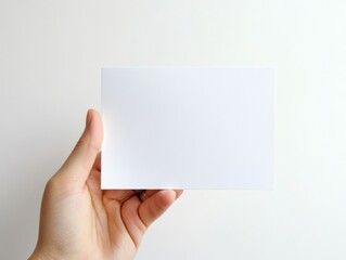 Clean, white, free , letterhead, sheet, template, blank, card, paper, with free space for text in hand, on light background, photo, presentation, advertising, contacts,