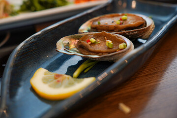 Korean food, side dishes with abalone marinated in soy sauce