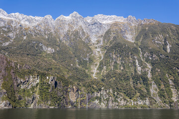 Milford sound fjord dominating dramatic mountain landscape in new zealand