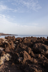 Volcanic rocks are covering the coast of the atlantic ocean