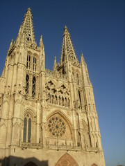 Burgos cathedral facade with ornate stone carvings on a sunny day