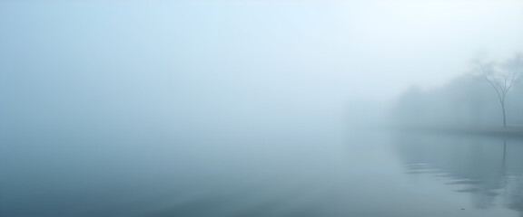 Fototapeta premium Foggy landscape with a calm lake and mist