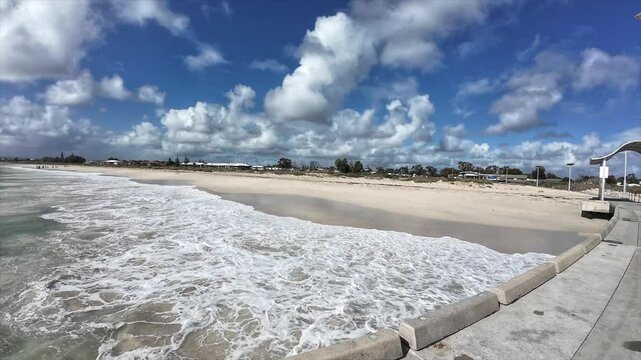 Waves coming up to the beach under the jetty at Jurien Bay. Beautiful shoreline.
