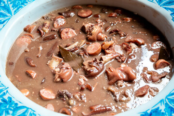 Traditional and true Brazilian feijoada prepared with the most authentic and classic ingredients
