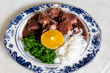 Traditional and true Brazilian feijoada prepared with the most authentic and classic ingredients