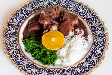 Traditional and true Brazilian feijoada prepared with the most authentic and classic ingredients