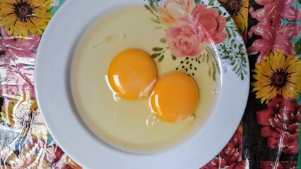 Two eggs on the plate 