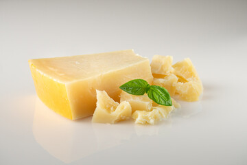 Authentic Italian Parmigiano Reggiano: Aged Cheese Wedge Isolated on White Background