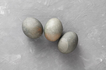 Easter eggs on grey concrete background