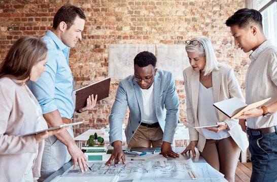 Architecture, blueprint and business people in meeting for planning, property development and building. Teamwork, collaboration and men and women in office with documents, floorplan and design