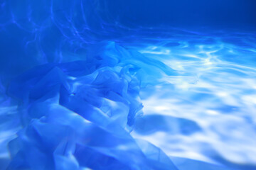 Blue underwater light background texture