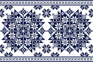 Fototapeta premium Pixel art embroidery pattern in blue and white colors.Repeating ukraine geometric pattern design with snowflakes, squares, and diamonds.Symmetrical and Clean.For use as background, wallpaper, textile.