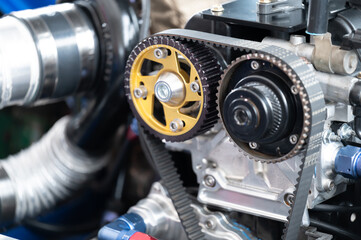 Close-up of high-performance engine precision timing belts and gears, highlighting advanced...